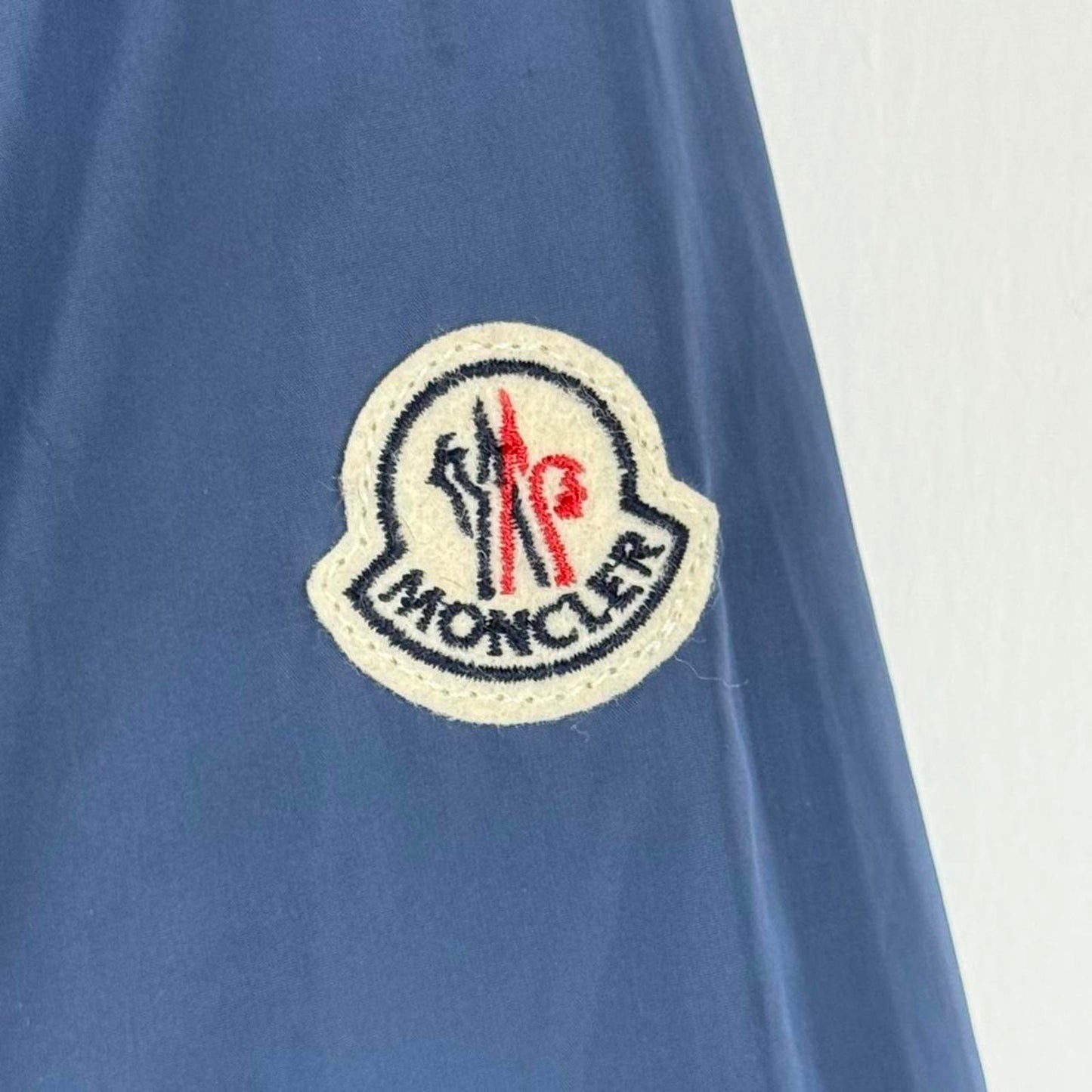 Moncler “Urville Giubbotto” Packable Hooded Jacket in Navy / Grey (M/L)