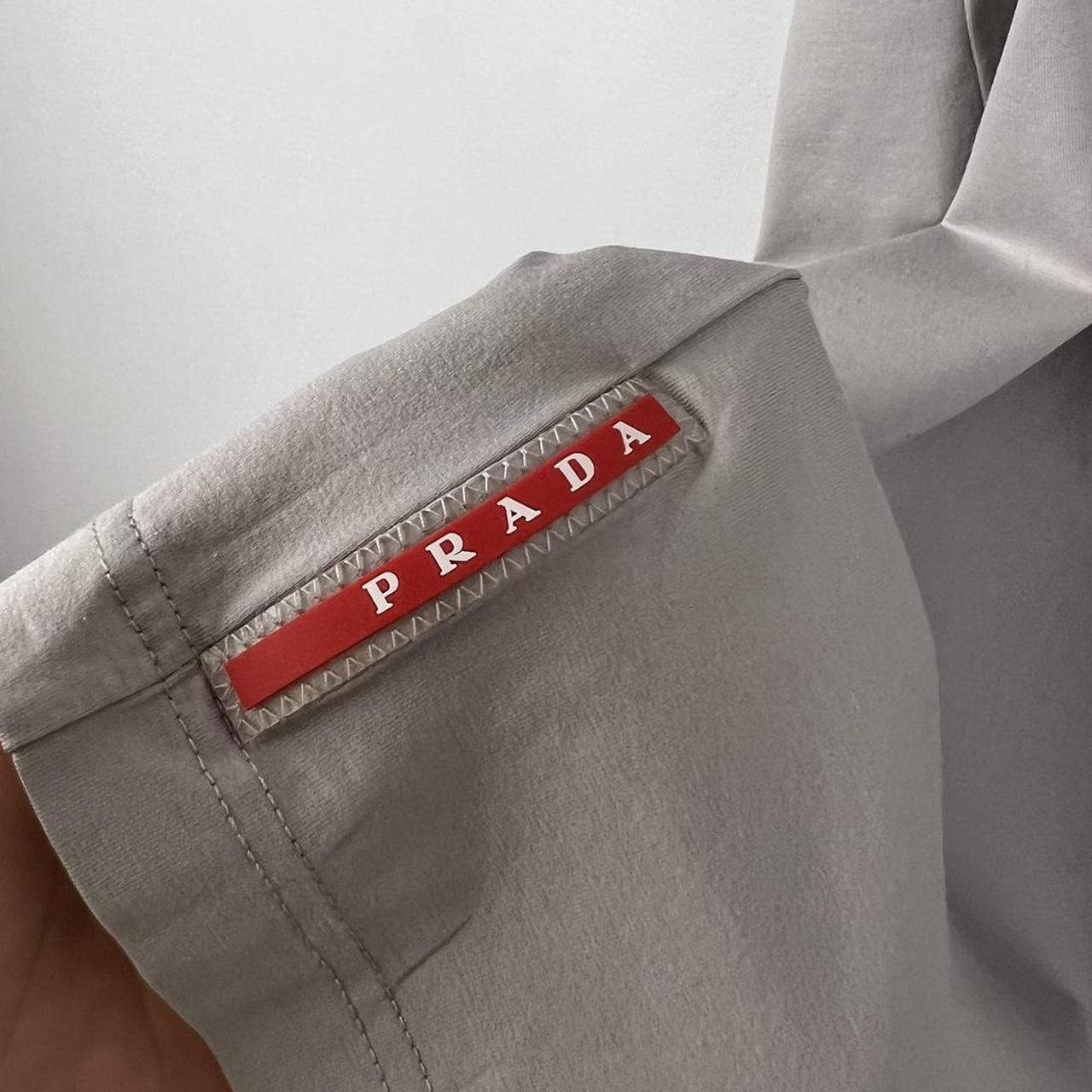 新作*PRADA*トライアングルロゴ付 コットンボーダーTシャツ